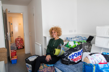 Single female student moving into her campus accommodation at the University of Hertfordshire